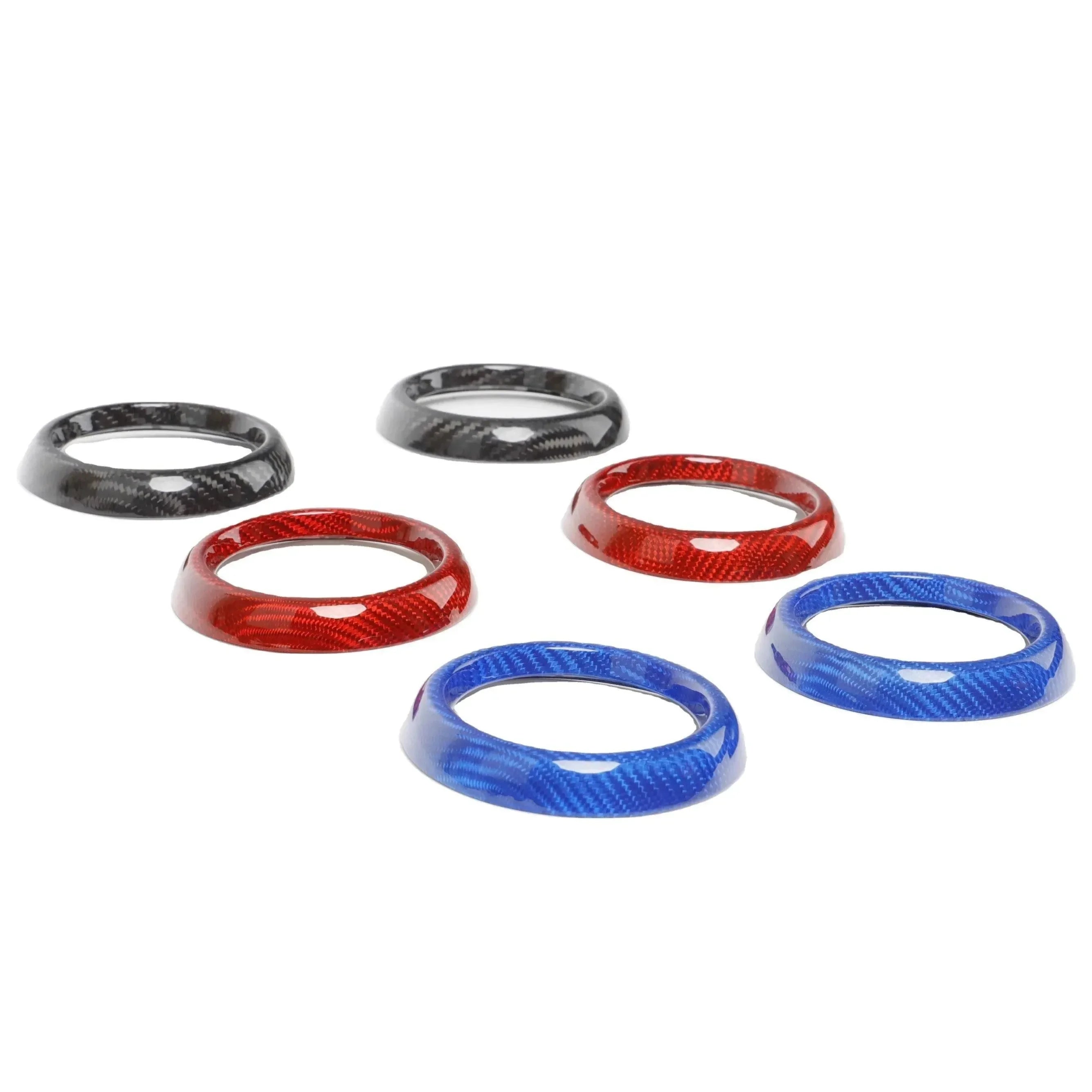 Carbon fiber trim rings in black, red, and blue for Chevy, Ford, Dodge, RAM vehicle accessories