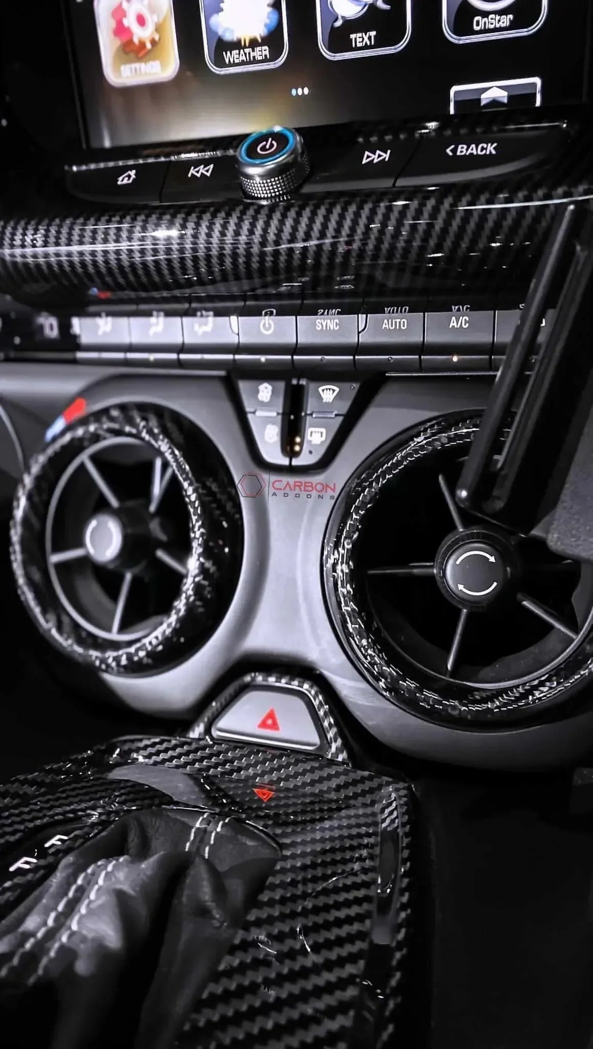 Carbon fiber interior trim for car dashboard, air vents, and gear shift with real carbon fiber accents