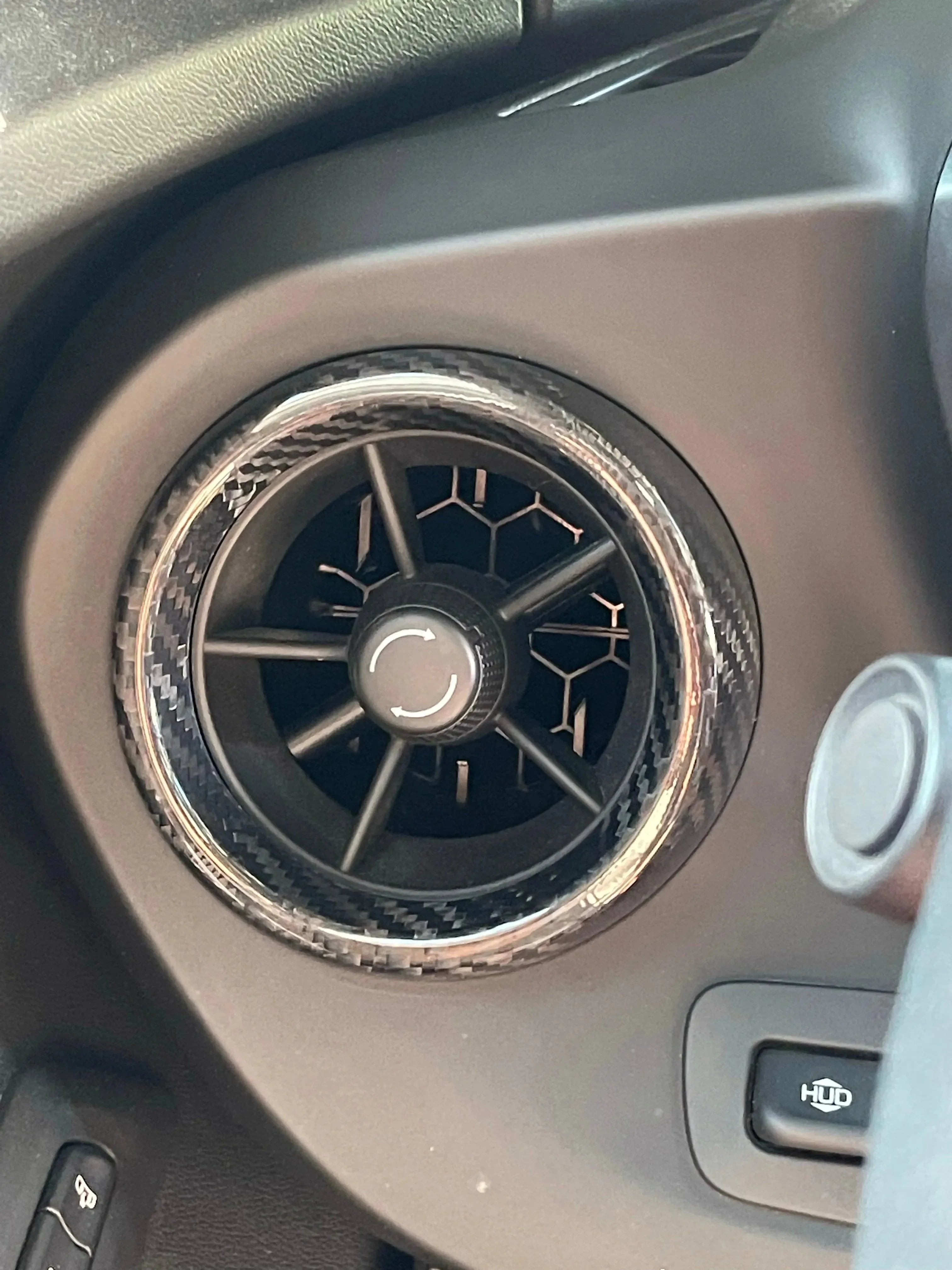 Real carbon fiber air vent trim for American vehicles, sleek interior upgrade with honeycomb design
