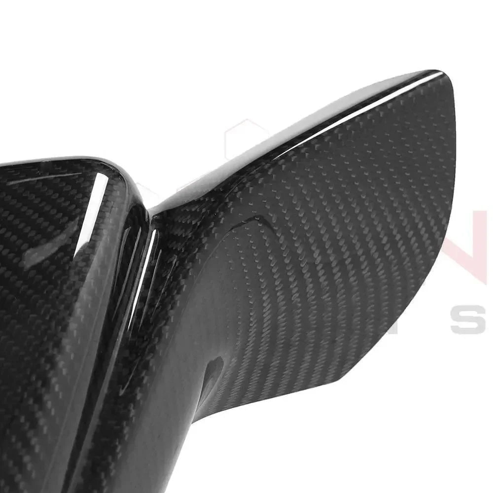 Glossy real carbon fiber automotive trim with woven texture, ideal for car interior or exterior upgrades.