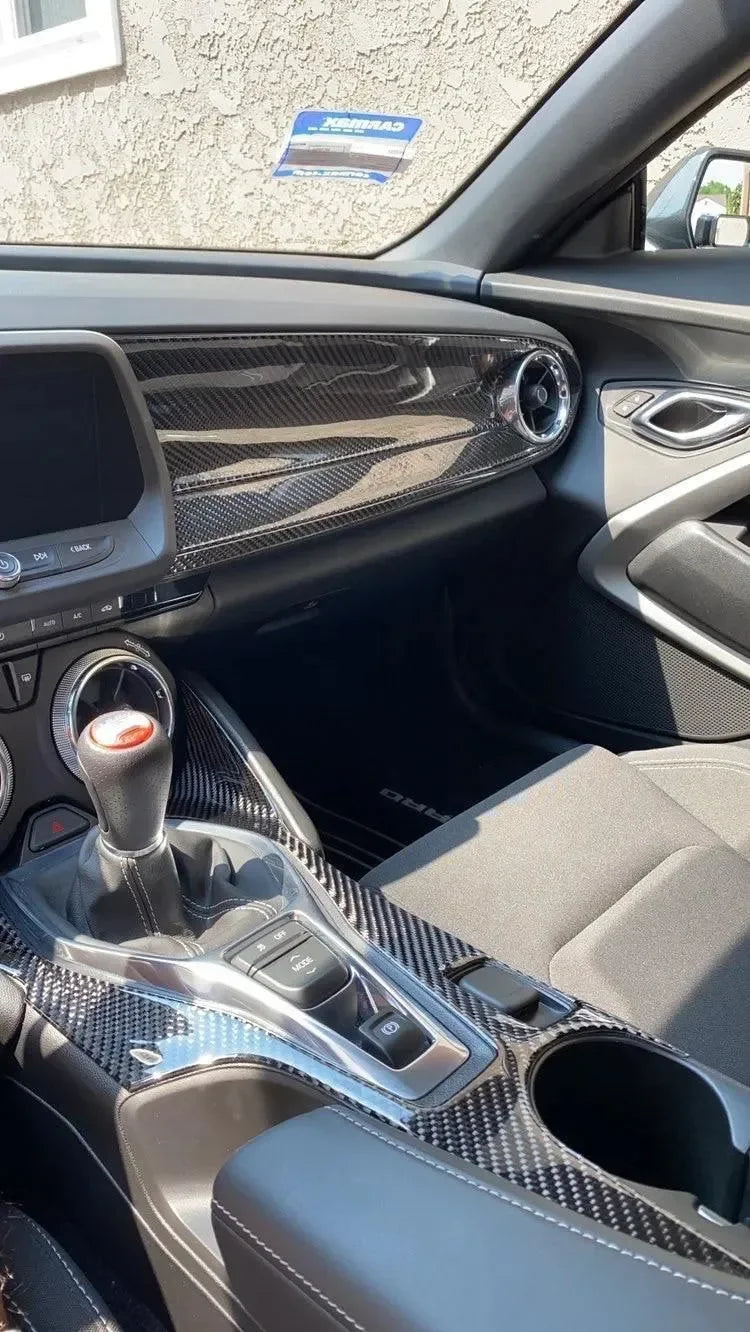 Real carbon fiber interior trim for Ford Mustang, featuring dashboard, center console, and gear shift accents.