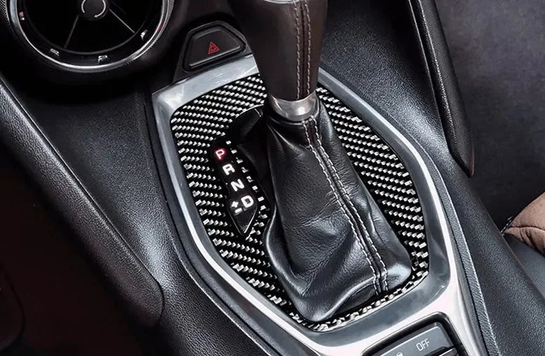 Real carbon fiber gear shift trim for American muscle cars, enhancing interior with sleek, durable finish.