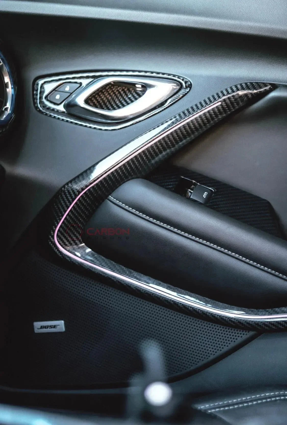Real carbon fiber interior trim with pink accent lighting for luxury car door panel