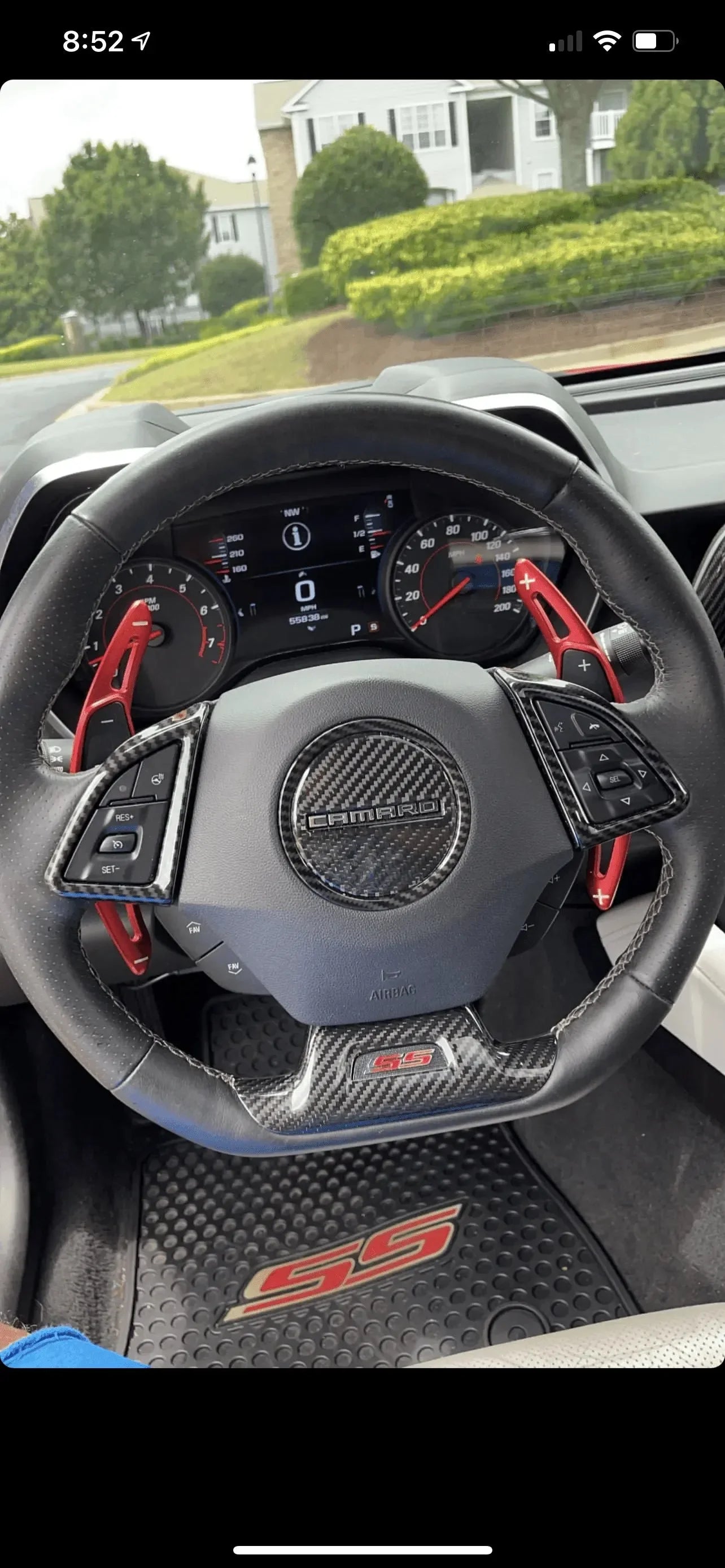 Chevy Camaro SS steering wheel with carbon fiber accents and red paddle shifters