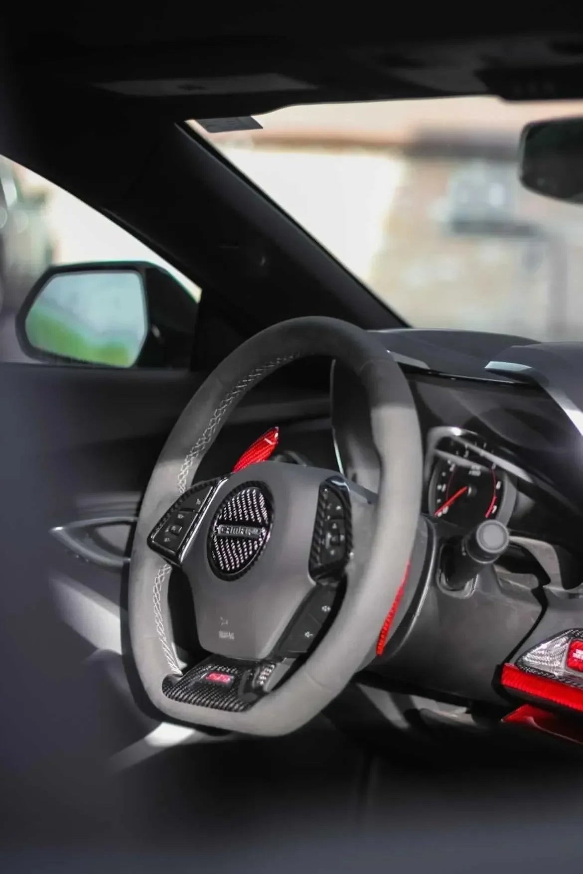 Carbon fiber steering wheel with red accents for American muscle cars