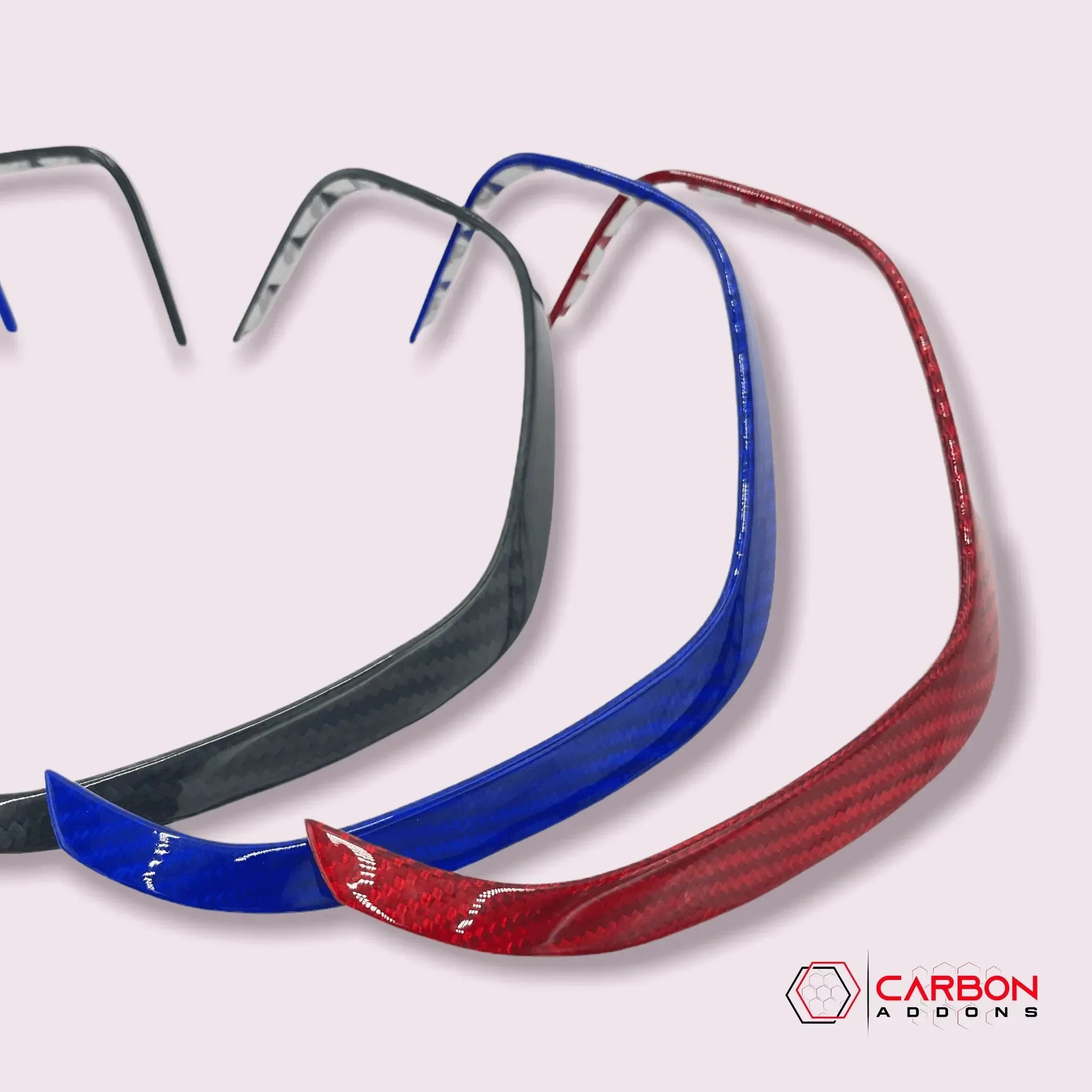 Real carbon fiber trim pieces in black, blue, and red for American muscle cars and trucks