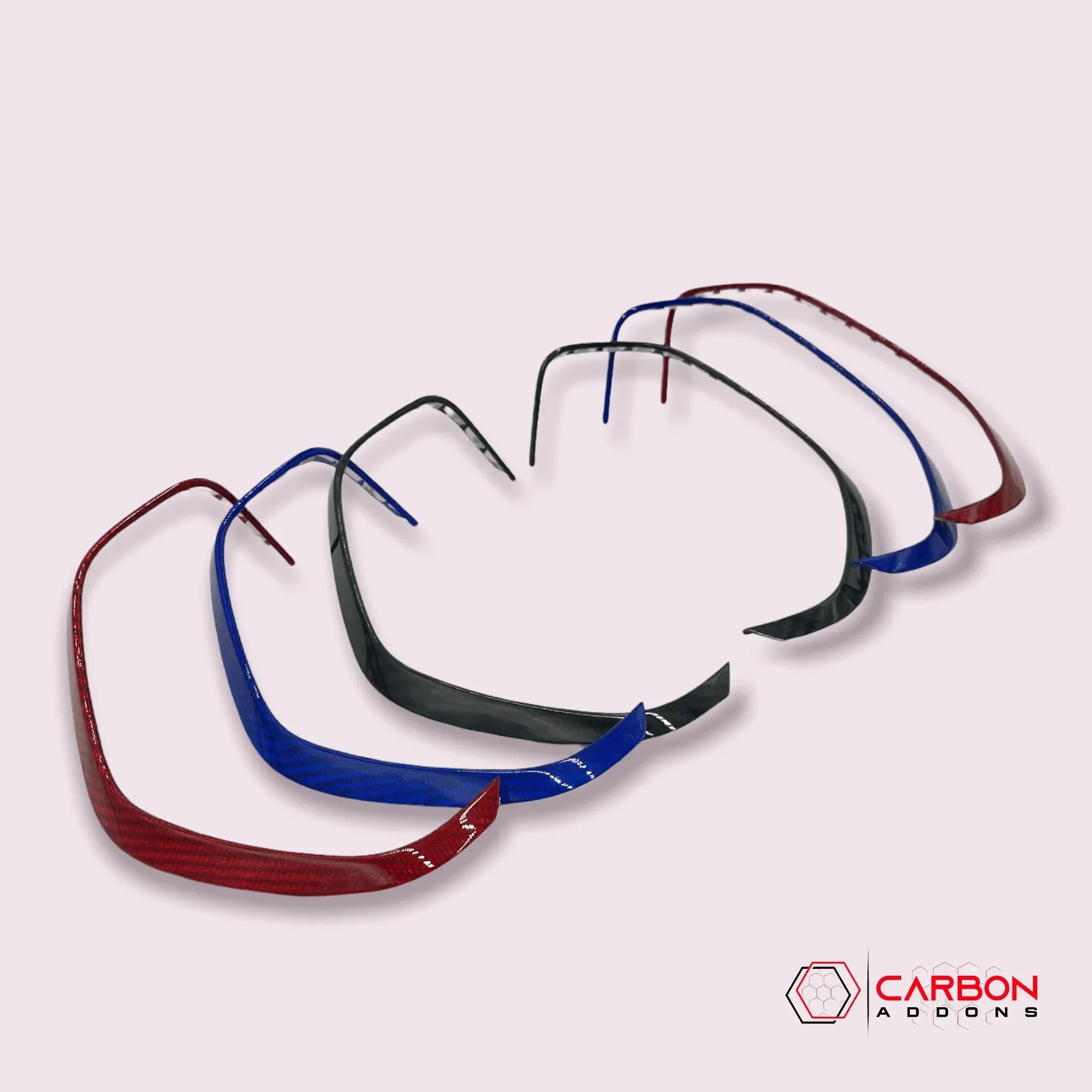 Real carbon fiber trim pieces in red, blue, and black for American muscle cars and trucks