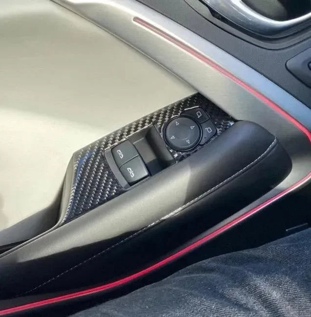 Carbon fiber interior trim with red stitching for American vehicles