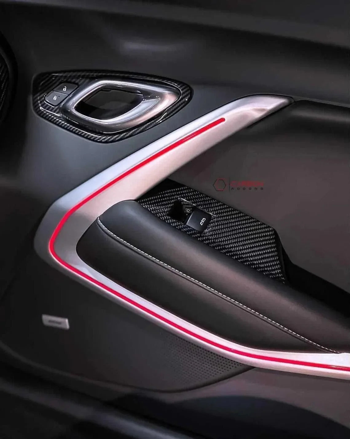 Carbon fiber door panel trim with red accent lighting for American muscle cars