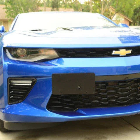 Front view of a blue Chevrolet car with a clear background