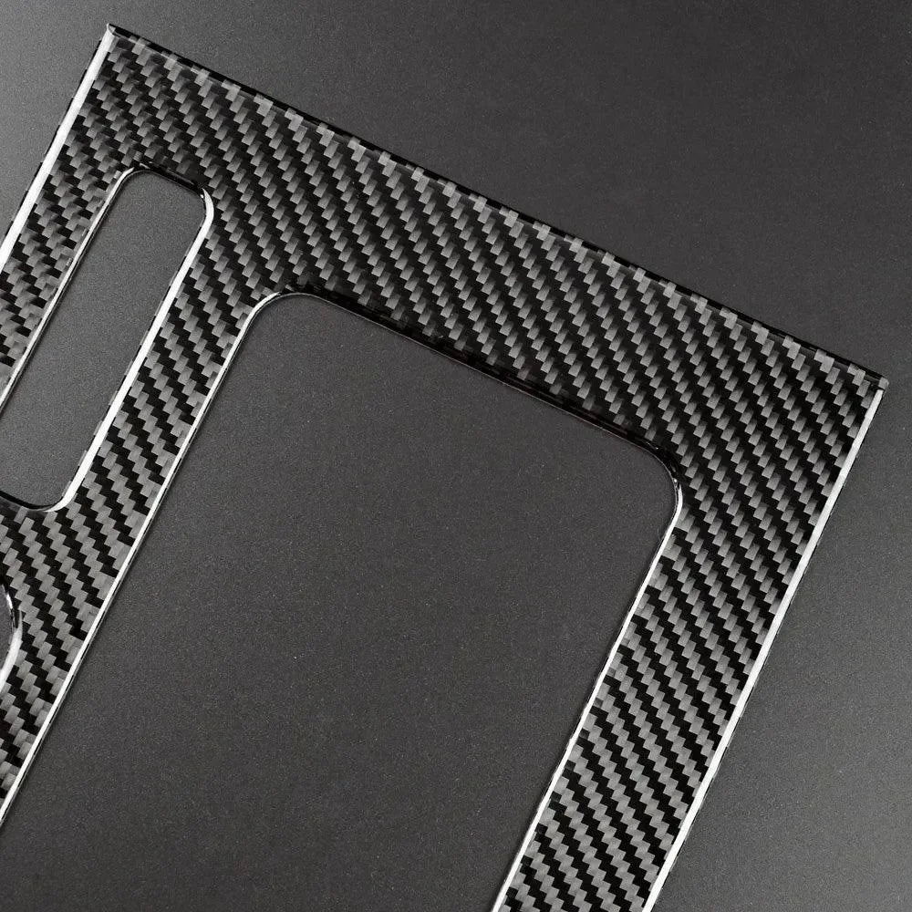 Real carbon fiber trim for car interior, sleek black weave design with precise cutouts
