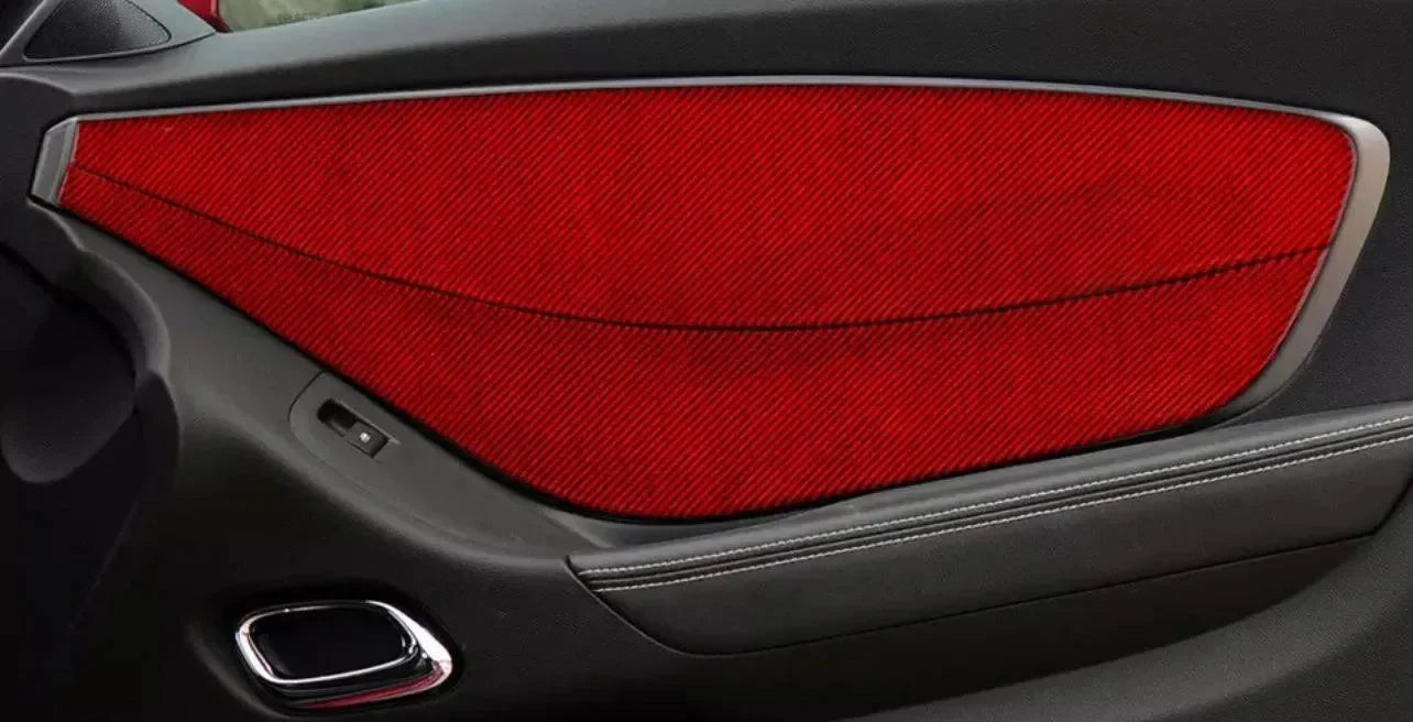 Red carbon fiber door panel insert for American muscle cars, enhancing interior style with real carbon texture.