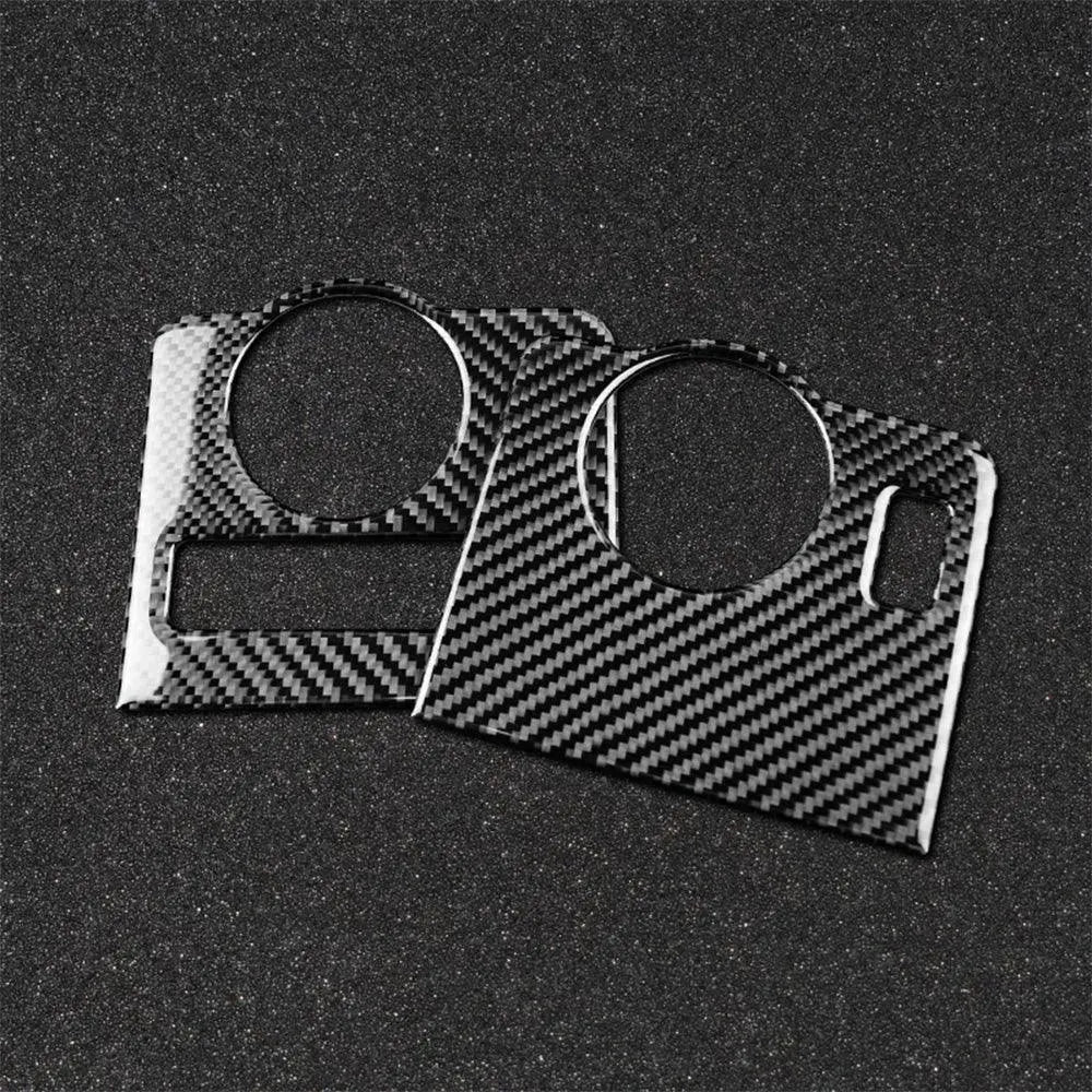 Real carbon fiber trim pieces for car interior, featuring circular cutouts and sleek weave pattern.