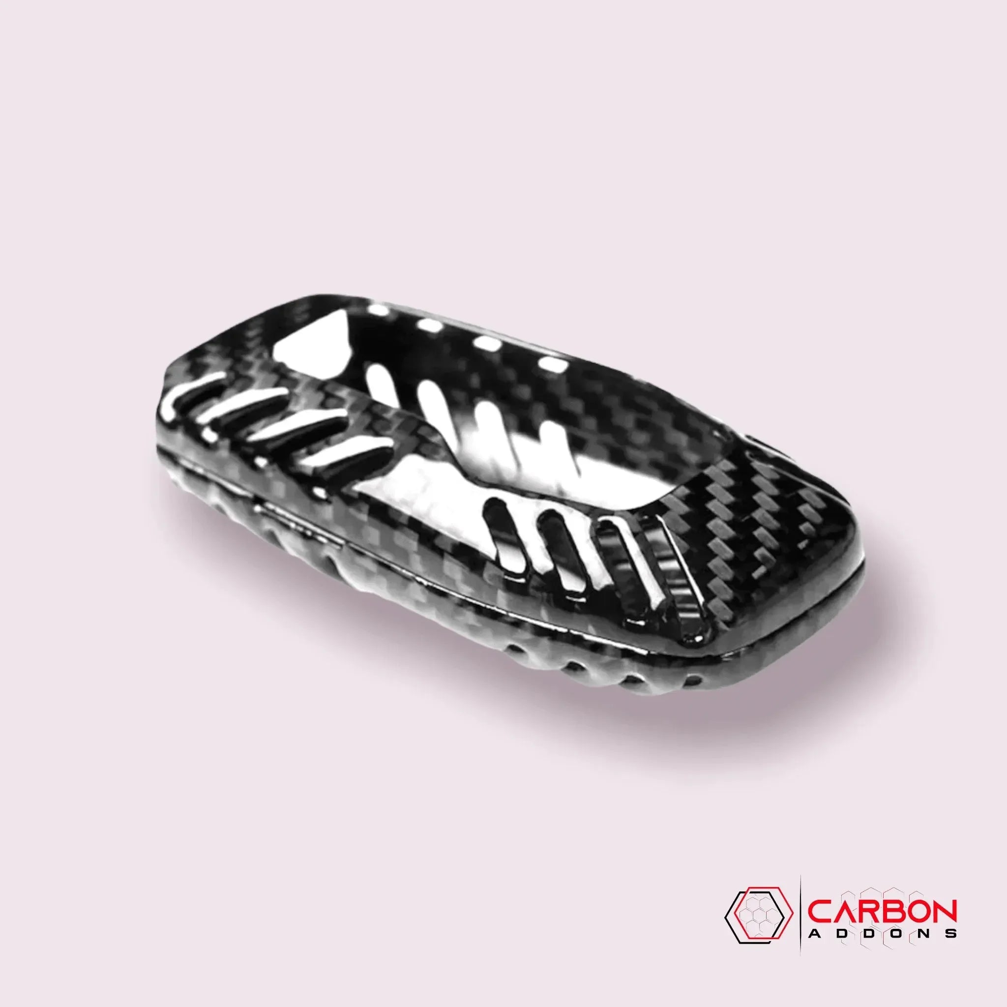 Real carbon fiber automotive trim with woven texture and precision cutouts for custom vehicle styling