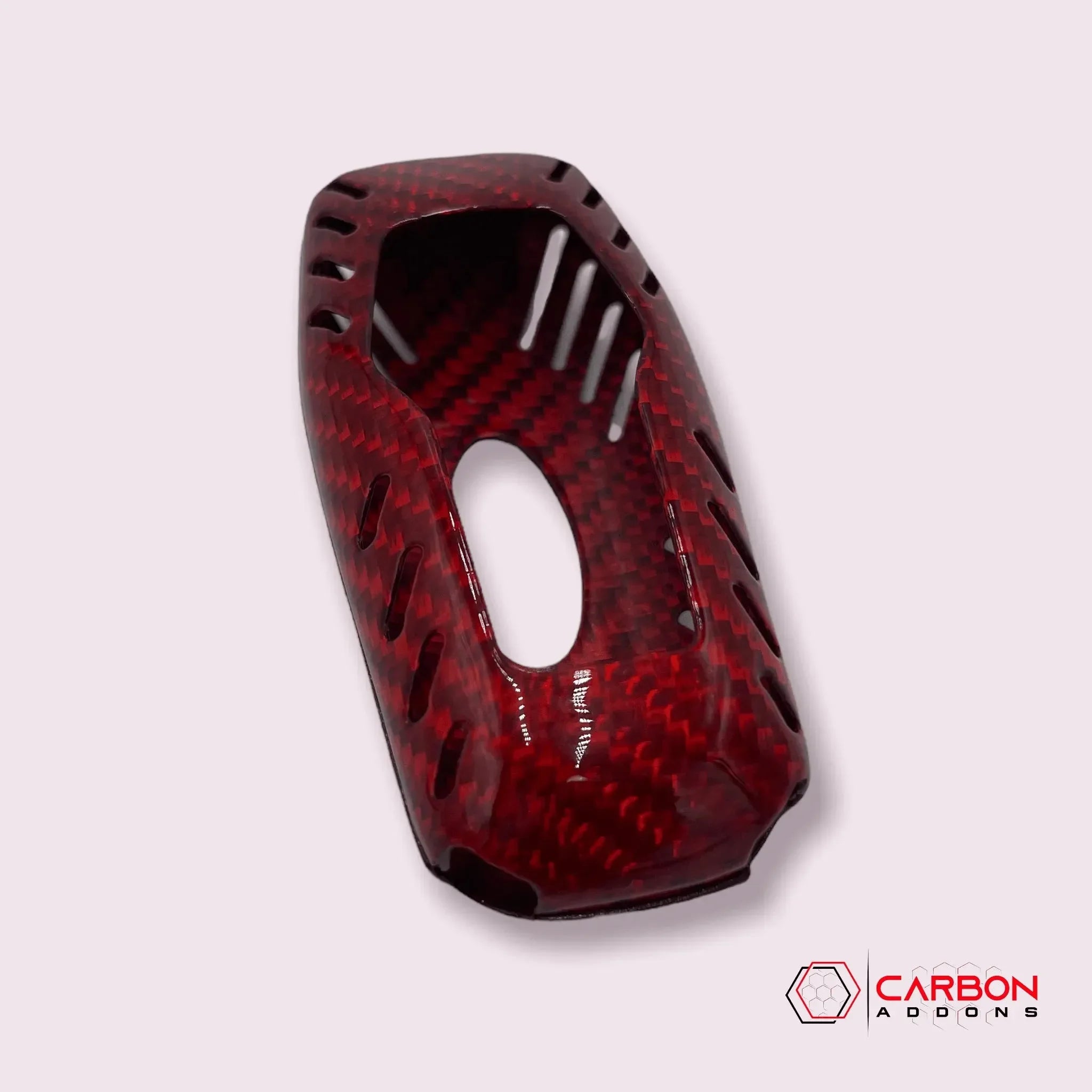 Red carbon fiber gear shifter cover with vented design for American muscle cars