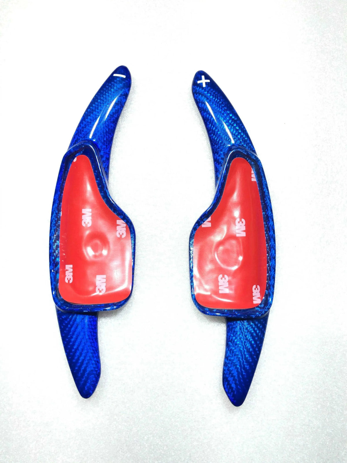Blue carbon fiber shift paddles with 3M adhesive backing for American vehicles