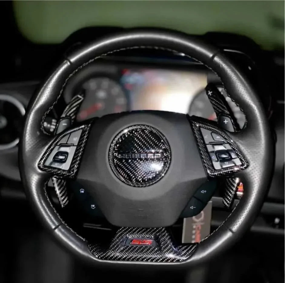 Real carbon fiber steering wheel trim for Chevy Camaro SS, enhancing interior with sleek, durable accents.