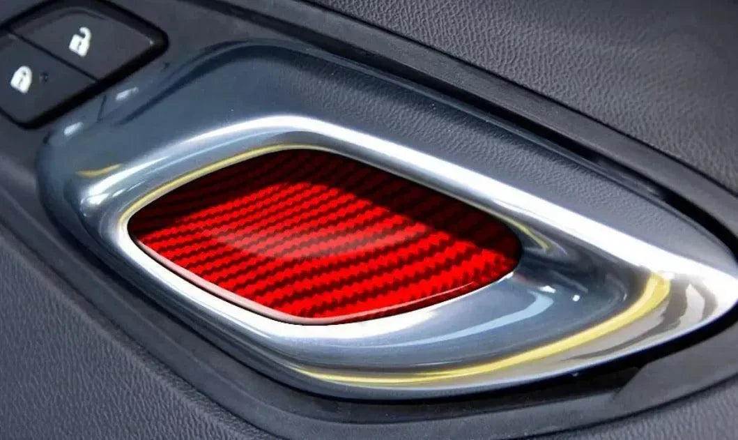 Red carbon fiber interior trim for American vehicles, sleek chrome accent, door panel detail