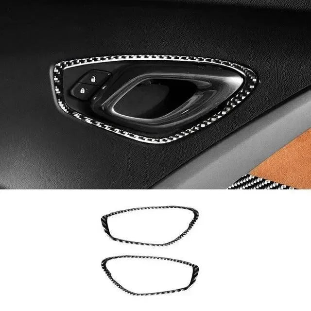 Carbon fiber door handle trim for American vehicles, enhancing interior style with real carbon fiber accents.
