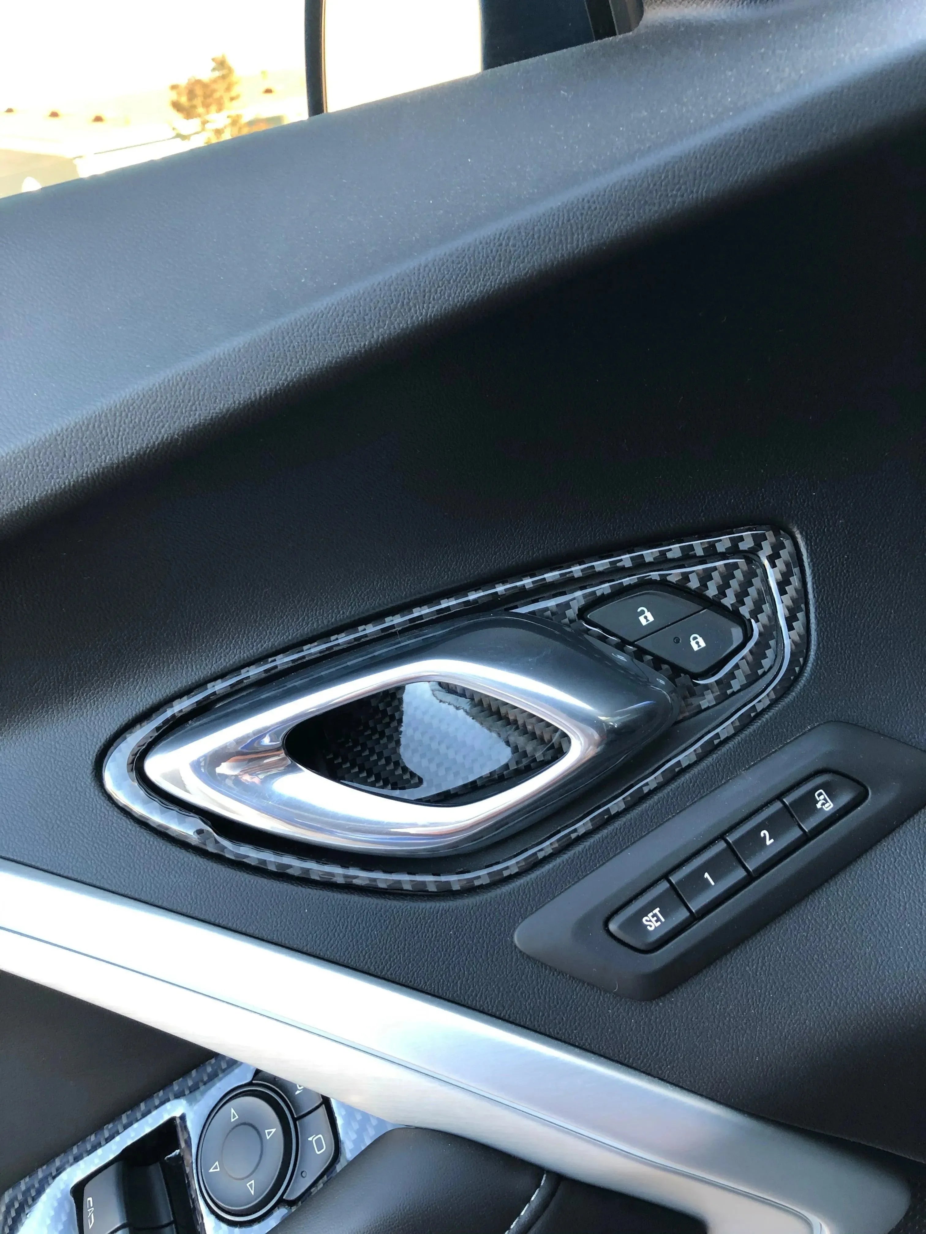 Real carbon fiber interior trim for car door panel with power window controls
