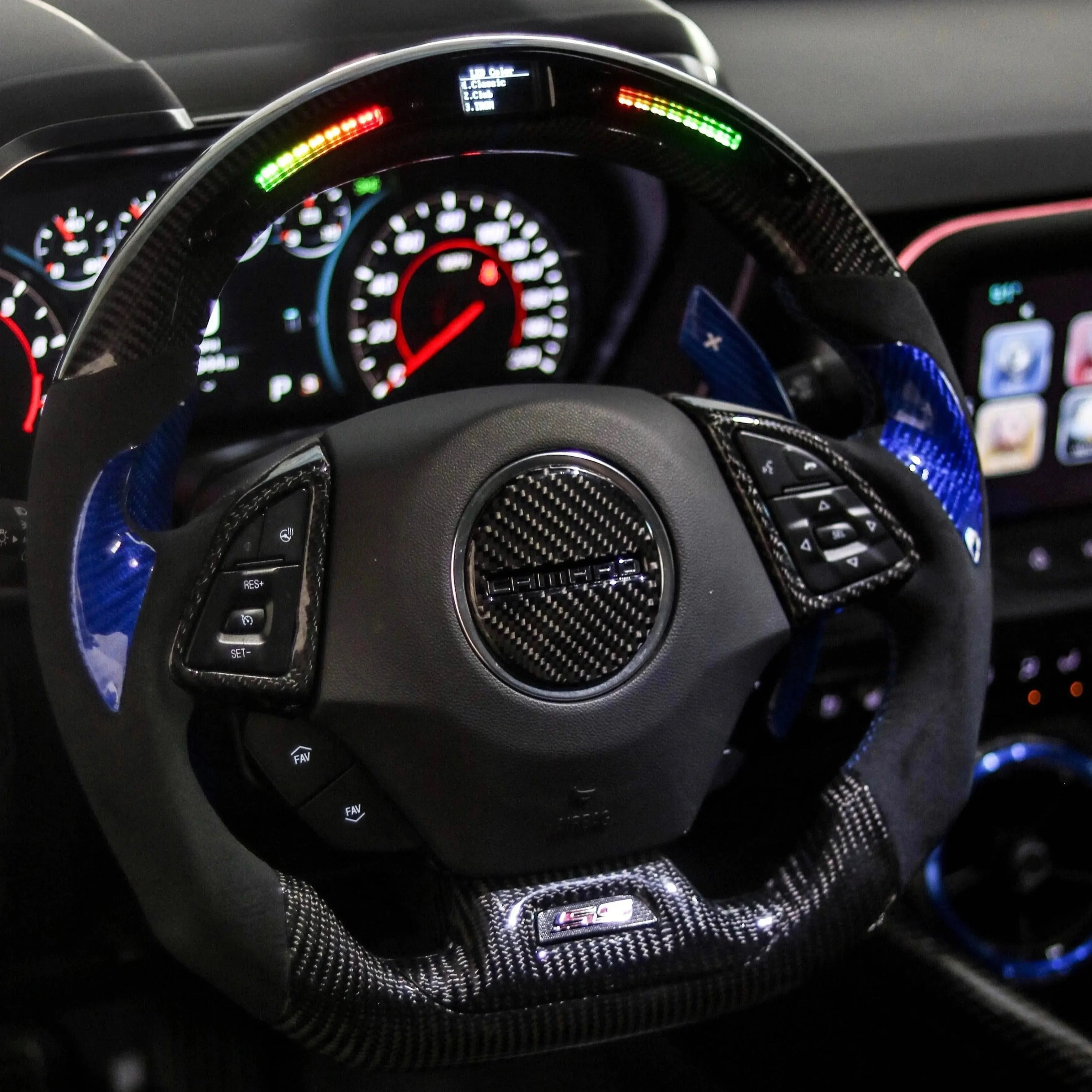 Carbon fiber steering wheel with RGB lighting and blue accents for Chevy Camaro SS interior