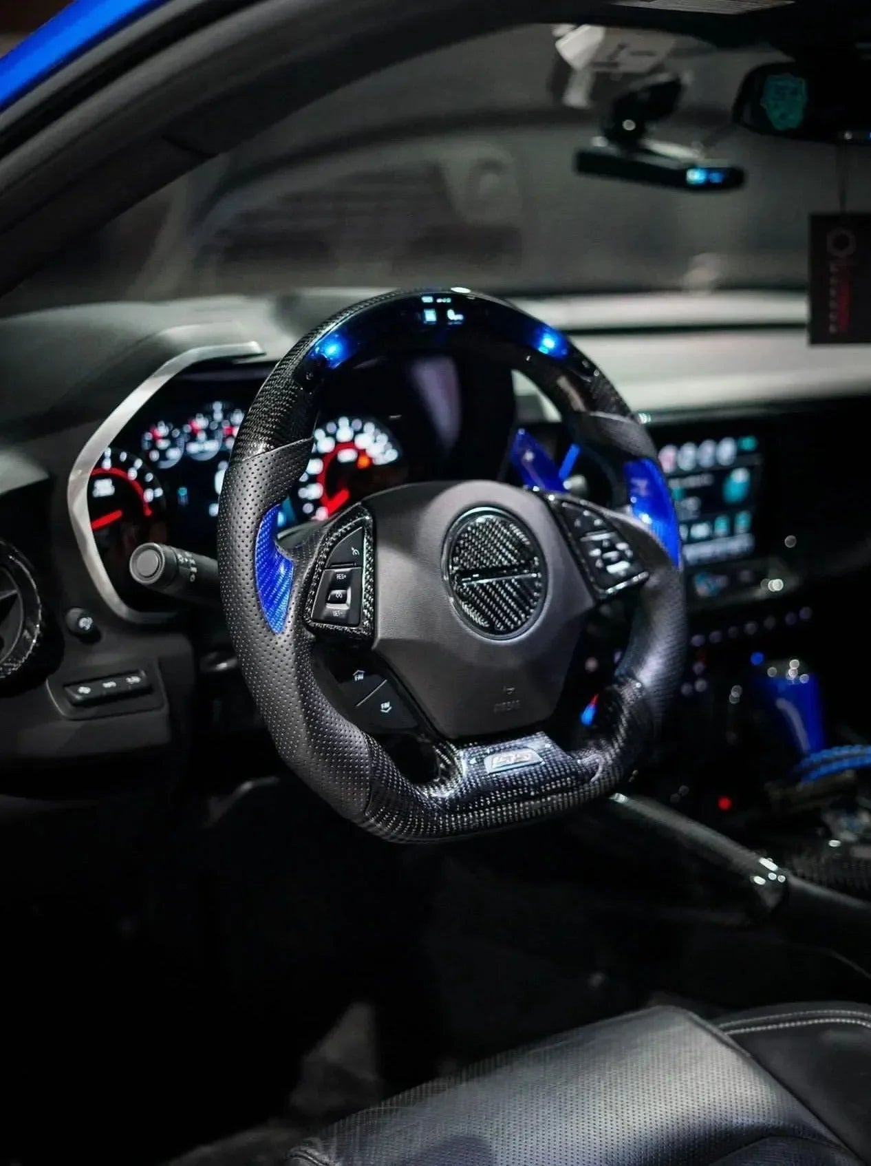 Carbon fiber steering wheel with blue accents for American performance vehicles