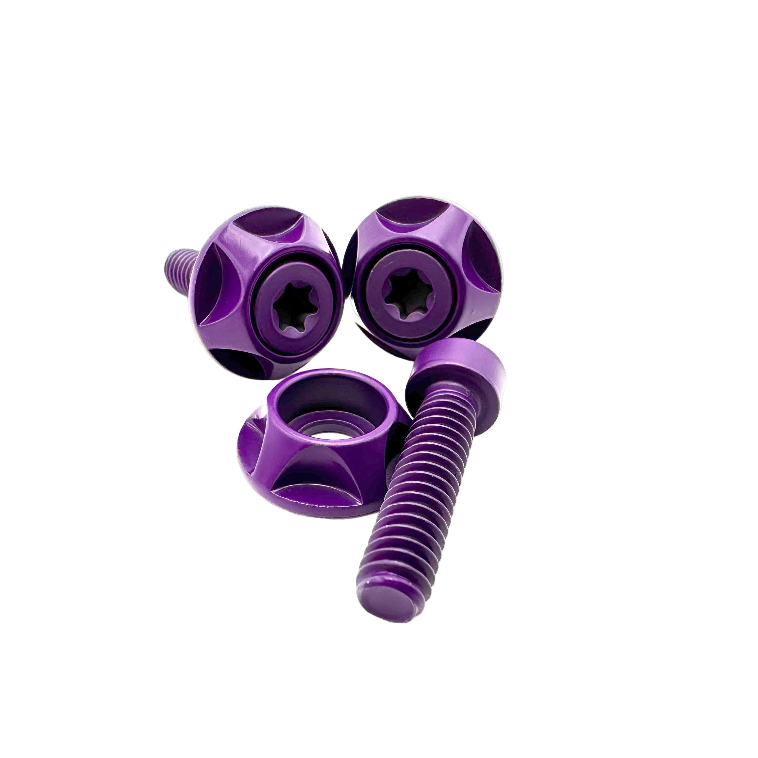 Four purple screws on a white background