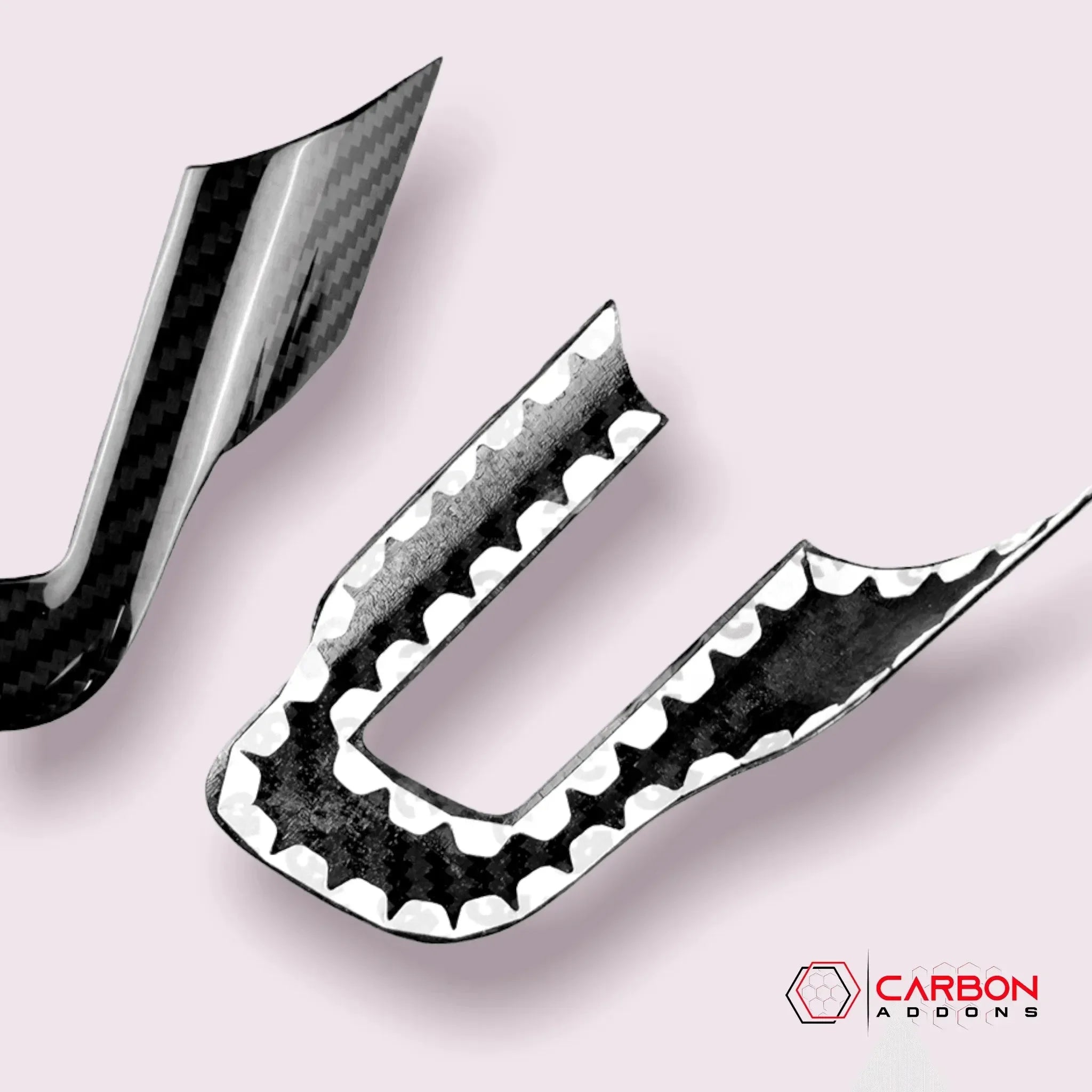 Real carbon fiber automotive trim pieces with glossy finish and precision cut edges for custom vehicle styling