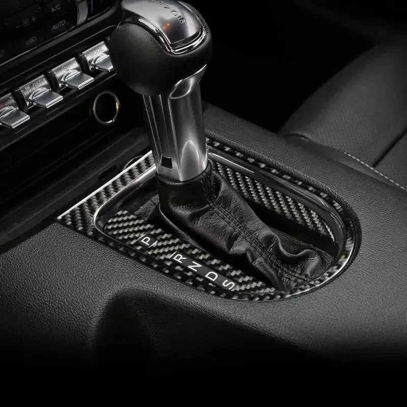 Real carbon fiber gear shift trim for American muscle cars, enhancing interior with sleek, durable finish.