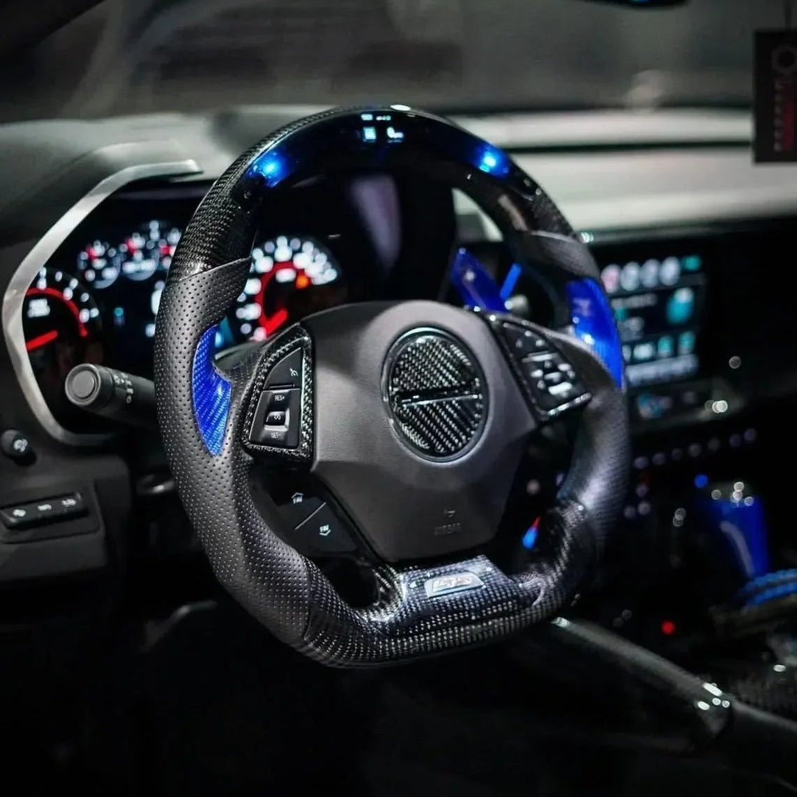 Carbon fiber steering wheel with blue accents for American performance vehicles